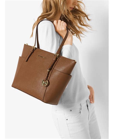 michael kors jet set east west top zip tote bag|Michael Kors saffiano tote bag.